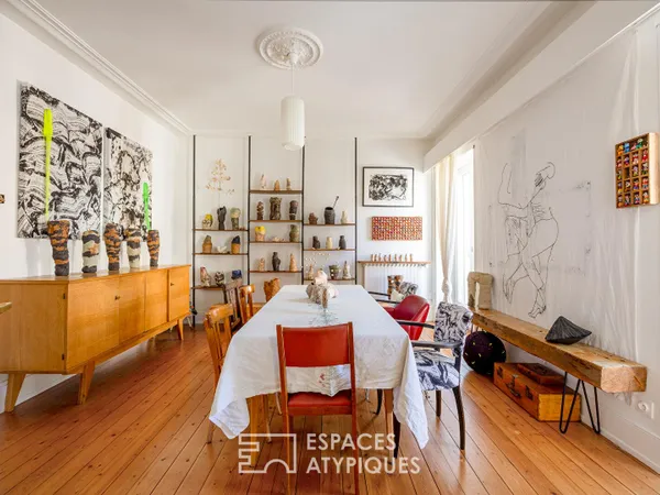 Maison de ville réinventée et son écrin de verdure