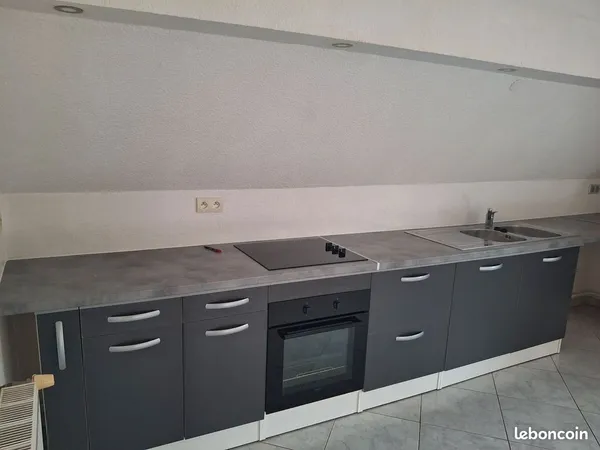 Appartement F4 115m² + places de parking