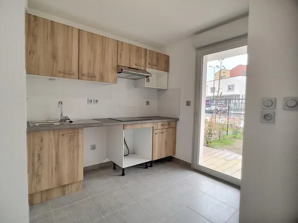 Appartement T3 de 65.48 m² avec terrasse et jardin de 142m²