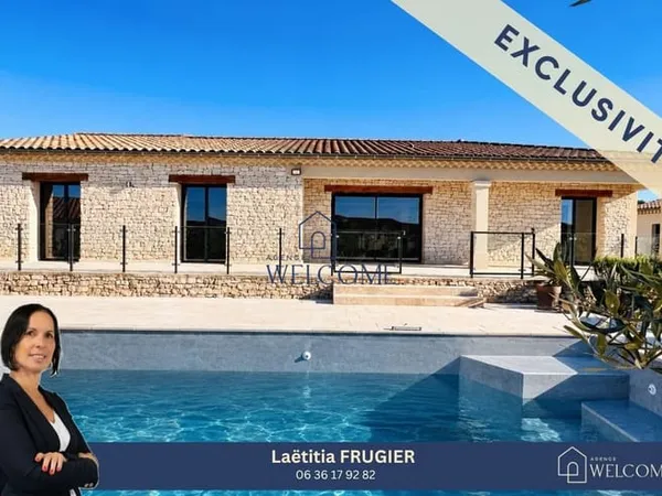 Maison familiale de plain-pied avec piscine et garage