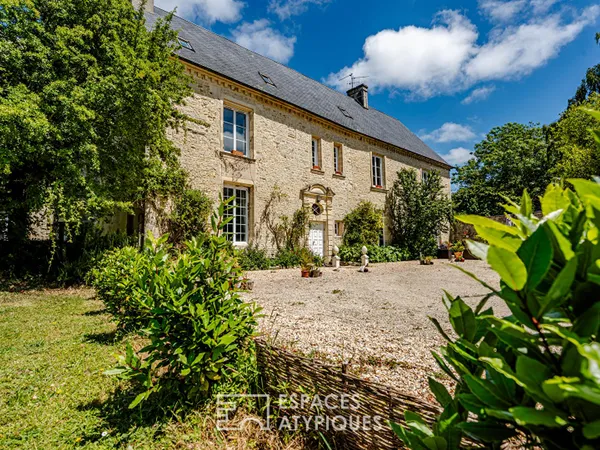 Ancien manoir dans un écrin de verdure