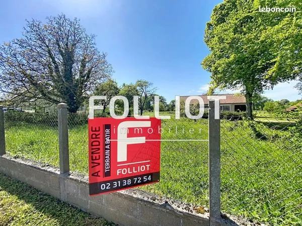 Terrain 810 m² LES MOUTIERS EN CINGLAIS