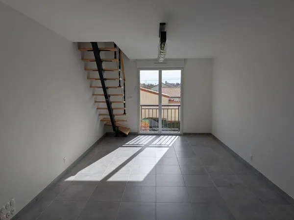 Appartement Duplex - 61m² - Grand garage 35m²