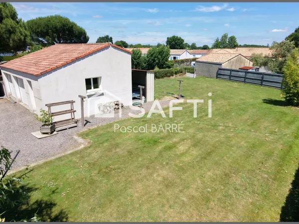 Terrain à bâtir avec garage - St-Julien-des-Landes