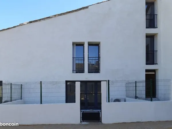 Appartement 90 m² avec cour