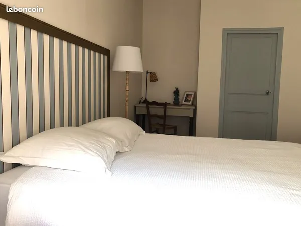 Chambre confortable dans maison familiale
