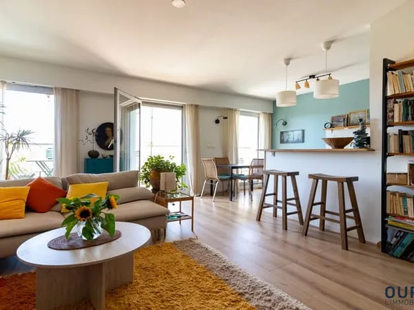 Un très beau 3-4 pièces de 91 m² avec balcon au coeur du cent