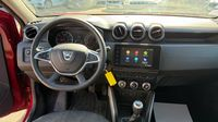 Dacia Duster 1.5 Blue dCi 115ch Prestige 4x4 — photo 11