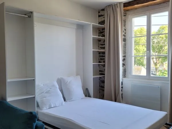 Studio 34 m² avec cachet et lit escamotable