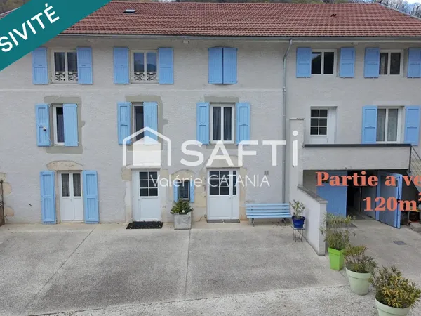 Tullins - Maison mitoyenne de 120m² habitables avec grand garage, cour.