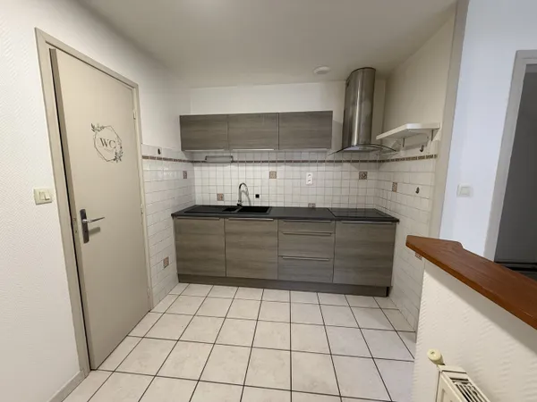 Grand appartement T2 situé au RDC