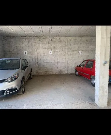 Place de parking à louer dans garage sécurisé