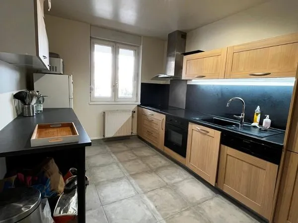 T4 83,5 m² - RDC avec parking souterrain et cave - 850 CC
