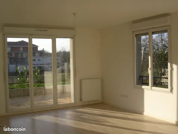 Appartement à louer F 3 avec jardin privatif et 2 terrasses