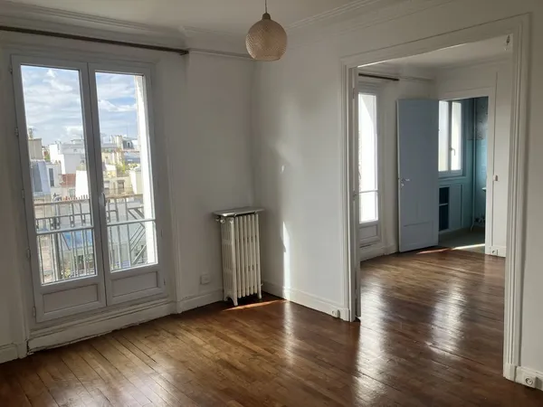 Appartement de 47m2 traversant au dernier étage d'un immeubl