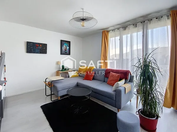 Appartement 3 pièces avec jardinet privatif