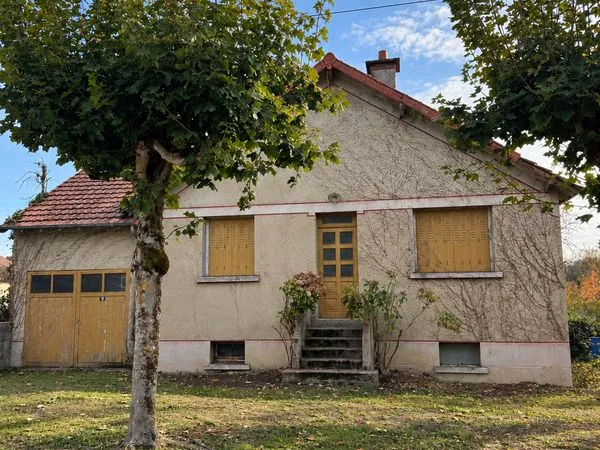 Maison de plain-pied avec sous-sol total, garage et terrain constructible de 806 m² - quartier résid