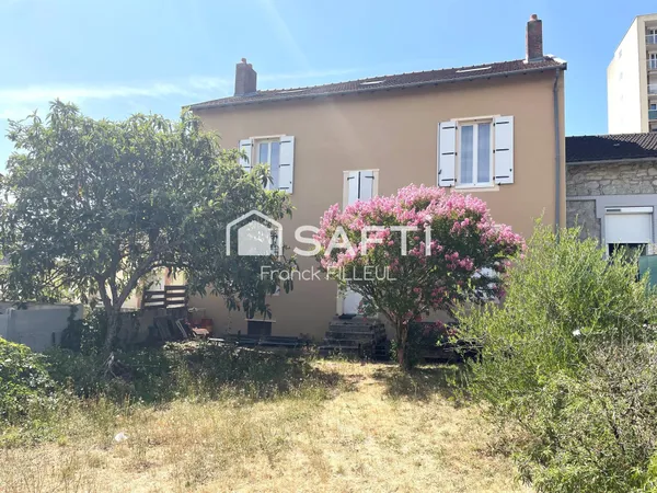 Grande maison de ville avec jardin