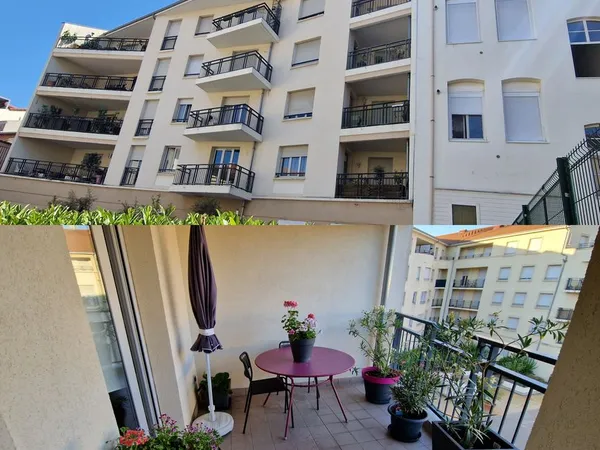 Appartement F4 87 m² avec terrasse, balcon et garage - Place Chavanelle