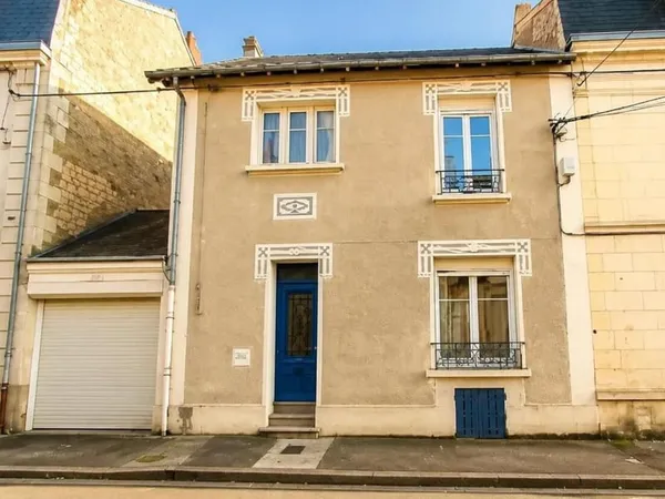 MAISON CENTRE VILLE AVEC JARDIN ET GARAGE