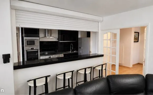 Appartement 85 m² - 3 chambres - 8e étage avec ascenseur - Véranda - Vues Tour Eiffel & La Défense -