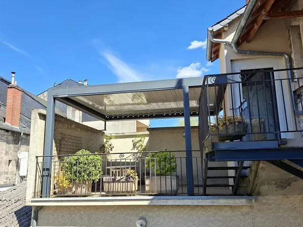 Appartement duplex grande terrasse et garage.