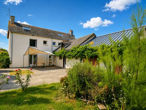 Maison familiale spacieuse avec verger.