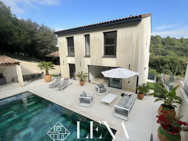 Maison d'architecte contemporaine avec piscine en pierre de