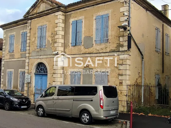 IMMEUBLE EN PIERRE DANS CENTRE VILLAGE