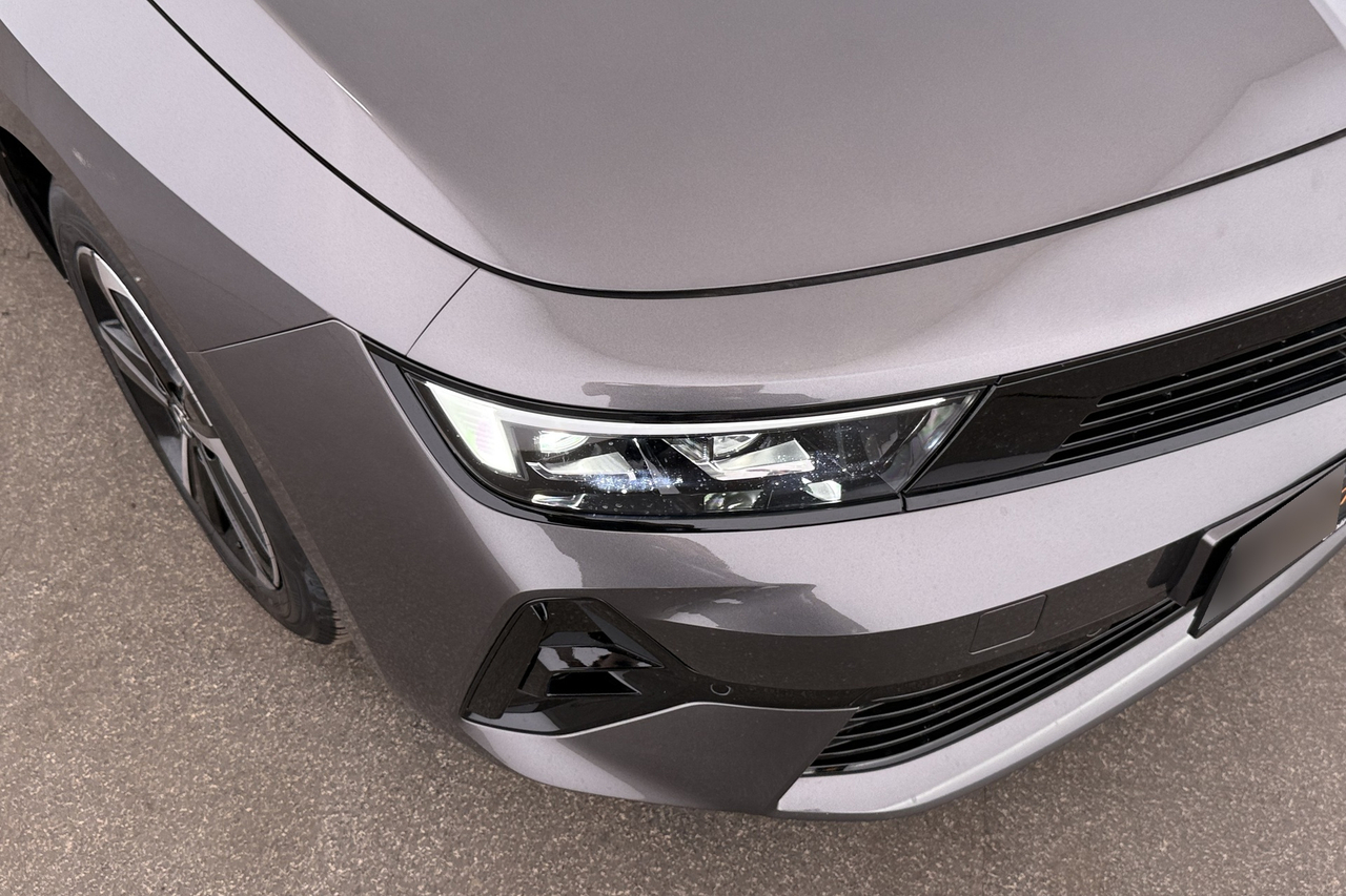Opel Astra — photo 11