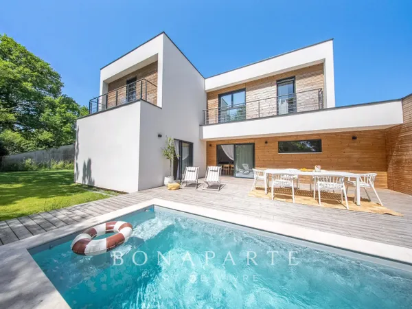 MAISON D'ARCHITECTE OSSATURE BOIS À QUESTEMBERT — PISCINE CHAUFF