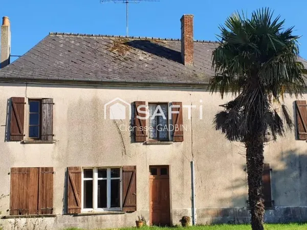 Maison de maître à rénover avec 8000 m² de terrain avec une partie constructible