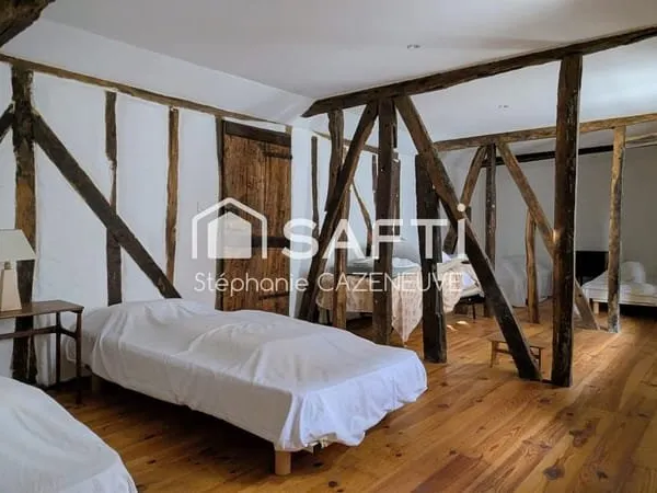 Bâtisse familiale 230 m² avec jardin et garage