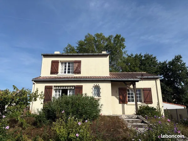 Maison avec possibilité de 5 chambres