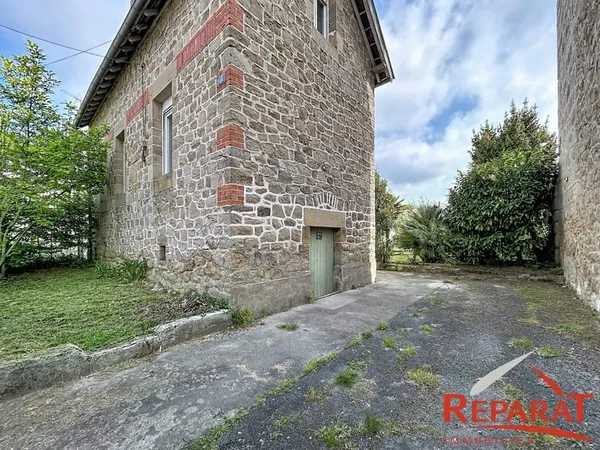 Maison en pierre de type F3 avec jardin