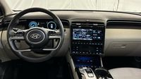 Hyundai Tucson 1.6 T-GDi 230ch Hybrid Executive BVA6 — photo 11