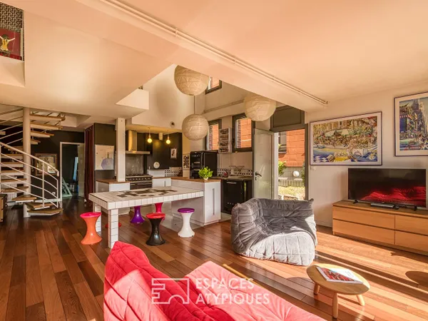 Loft duplex avec loggia et jardin, dans un ancien batiment portuaire