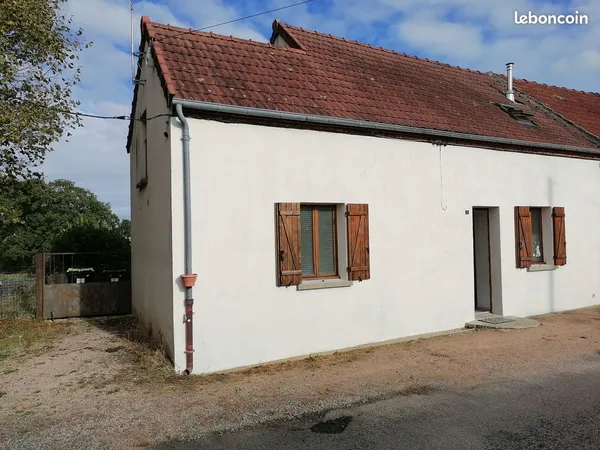 Maison avec puit et terrain