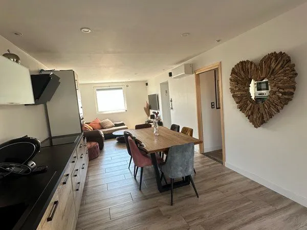 Appartement RDC dans maison divisée en 2 lots
