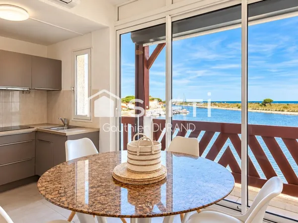 SAINT-CYPRIEN - ÎLE DE LA LAGUNE | DUPLEX D'EXCEPTION ENTRE MER ET MARINA