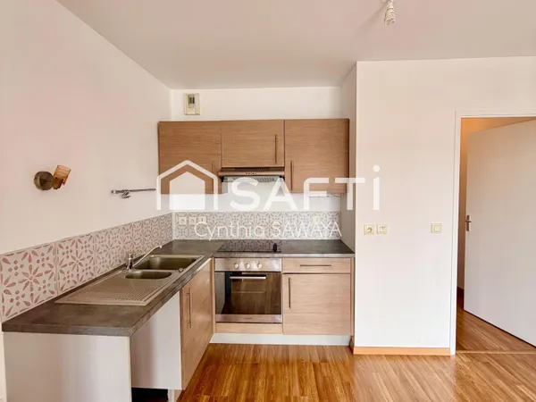 Bel appartement avec 2 balcons, ascenseur et 2 places de parking