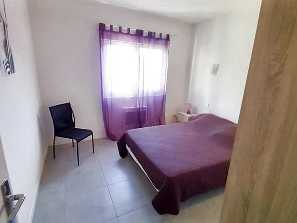 Grand Appartement T3 64 M2 + 2 caves .