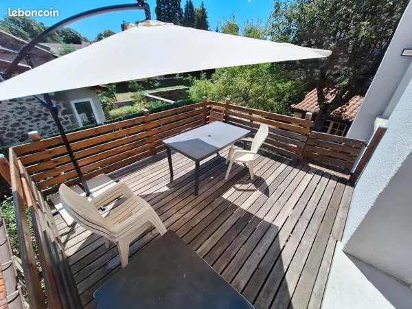 À LOUER - Appartement avec jardin et terrasse en plein centre