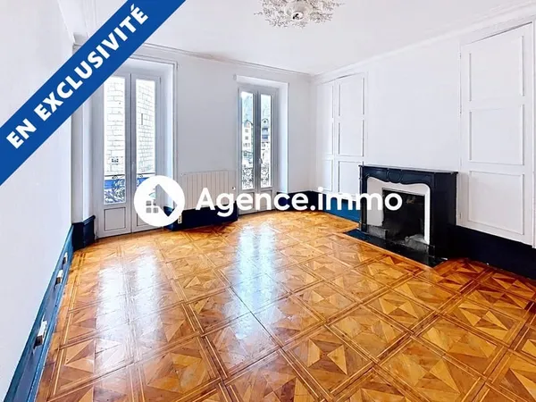 Appartement T4 de 79 m² avec balcon en centre-ville de Thônes