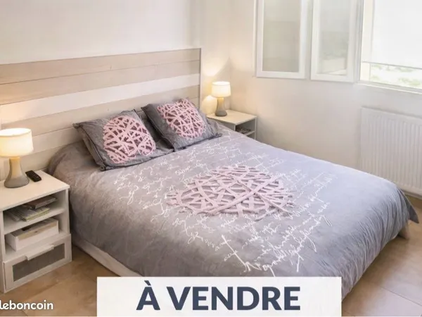 Maison jumelée jardin et garage
