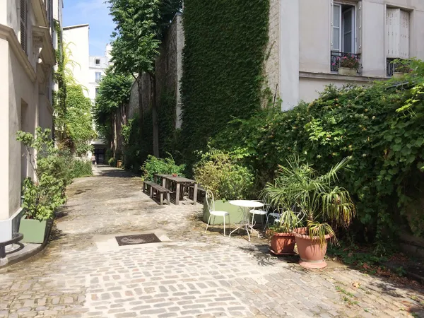 Vente appartement atypique au dernier étage d'une copropriété de charme arborée