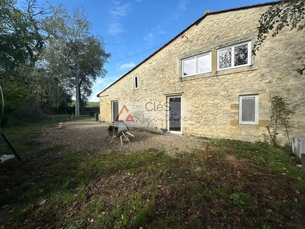 Maison en pierre de caractère avec jardin
