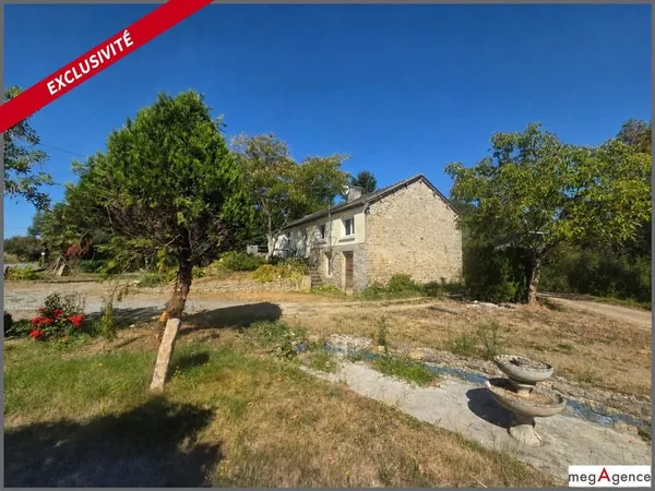 Ensemble immobilier - Maison d'habitation et grange à rénover sur plus de 1.4 hectare