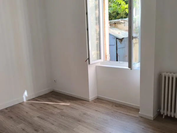 Appartement T2 RDC plein centre petit jardin