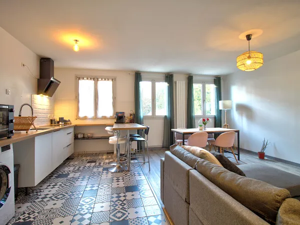 AGEN - Appartement de 57m² avec 2 chambres et place de parking privative.